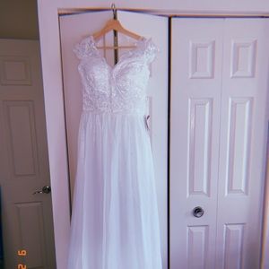 Beautiful, delicate, bohemian wedding dress